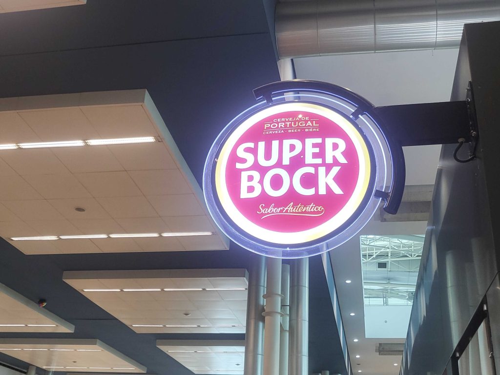 Super Bock sign outside a cafe at Porto airport, Porto
